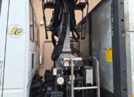 Autocarro Iveco Eurocargo 100E22 bianco con caricatore Icarbazzoli e polipo retrocabina