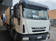 Autocarro Iveco Eurocargo 100E22 bianco con caricatore Icarbazzoli e polipo retrocabina