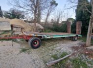 Rimorchio 2 assi CTC verde con rampe a molla posteriori per trasporto macchinari industriali