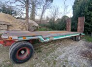 Rimorchio 2 assi CTC verde con rampe a molla posteriori per trasporto macchinari industriali