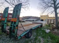 Rimorchio 2 assi CTC verde con rampe a molla posteriori per trasporto macchinari industriali
