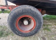 Rimorchio 2 assi CTC verde con rampe a molla posteriori per trasporto macchinari industriali