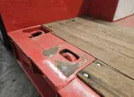 Semirimorchio rosso carrellone Goldhofer 4 assi con vasca culla allungabile e collo staccabile