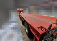 Semirimorchio rosso carrellone Goldhofer 4 assi con vasca culla allungabile e collo staccabile