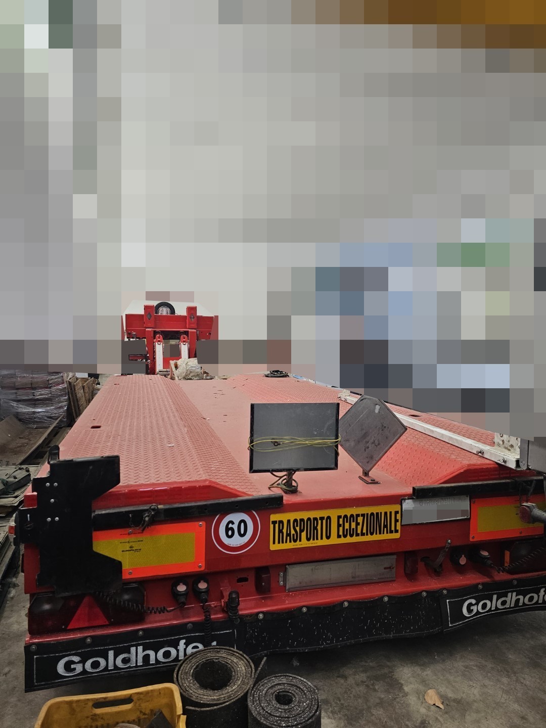 Semirimorchio rosso carrellone Goldhofer 4 assi con vasca culla allungabile e collo staccabile